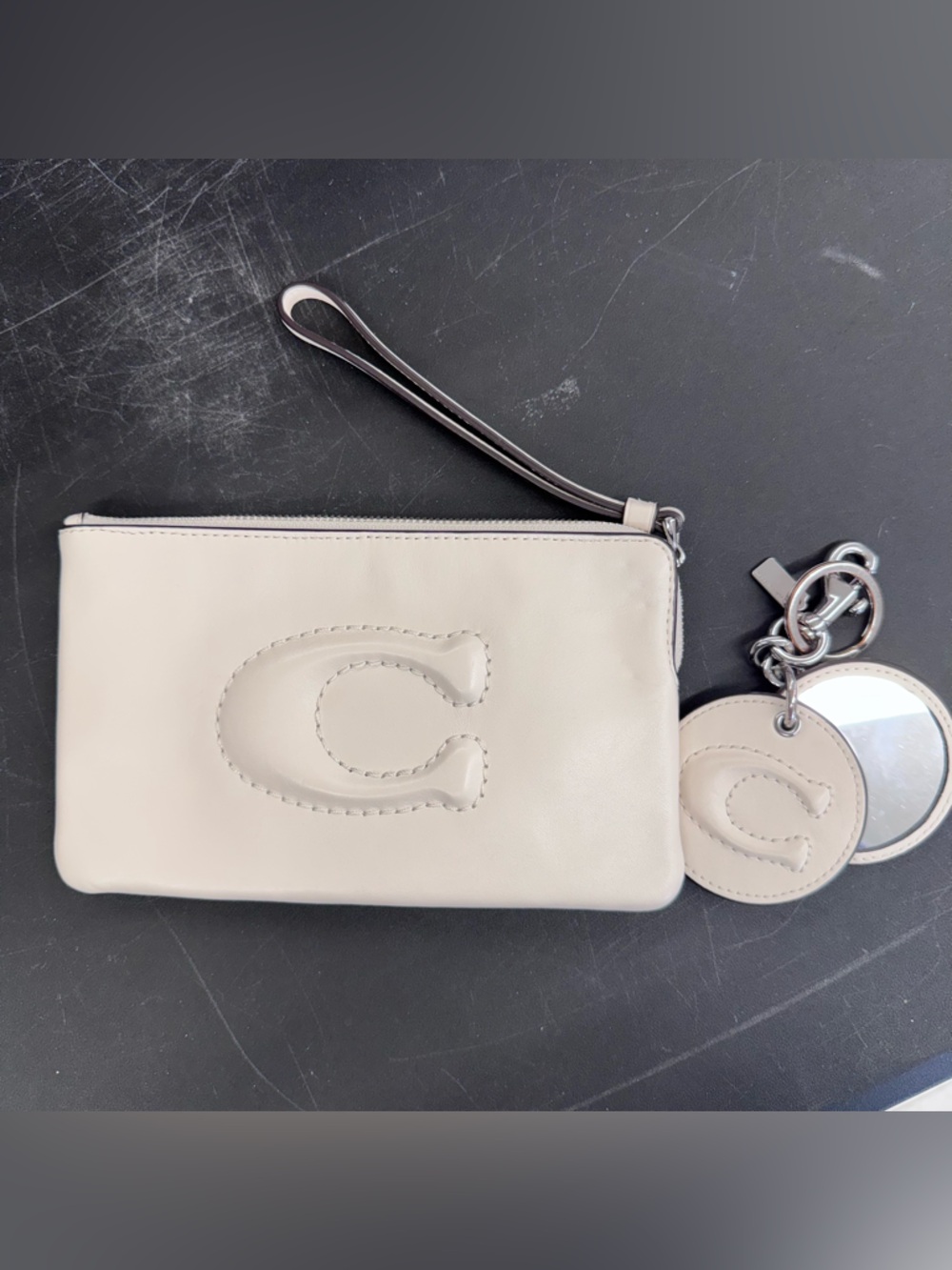 Coach Cream Leather Wristlet with Logo Charm